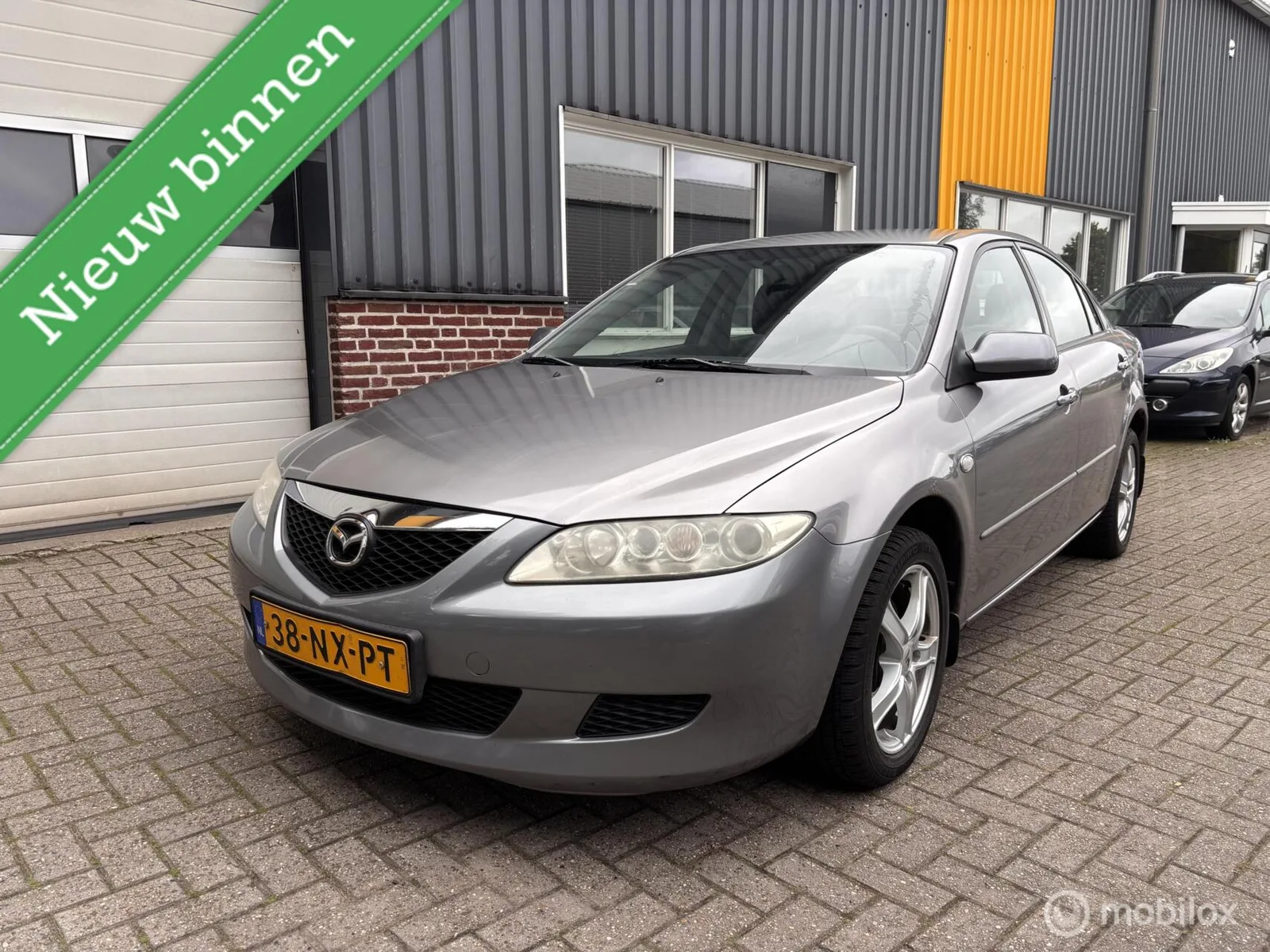 Mazda 6 (2004) — foto 1