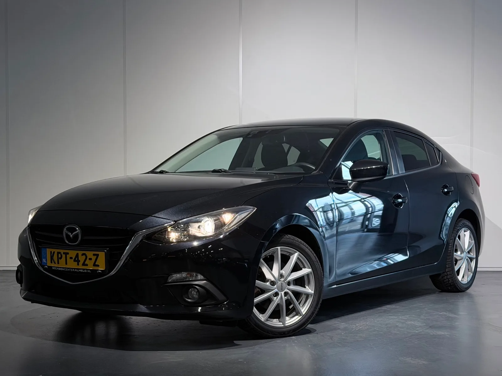 Mazda 3 (2014) — foto 1
