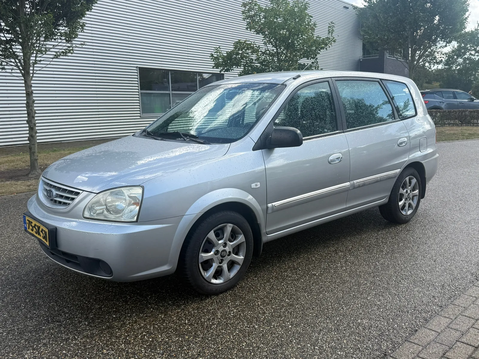 Kia Carens (2006) — foto 1