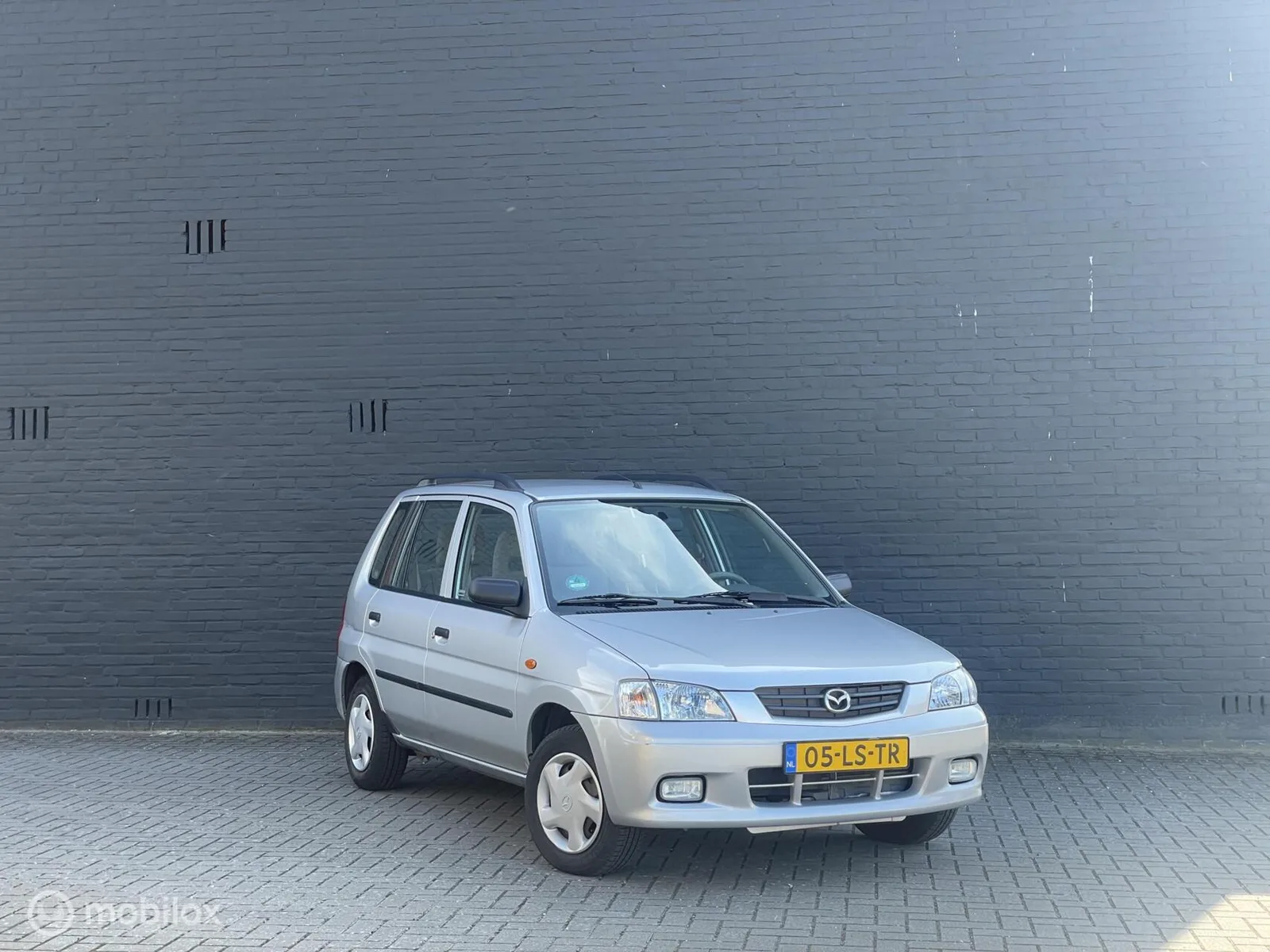 Mazda Demio (2003) — foto 1