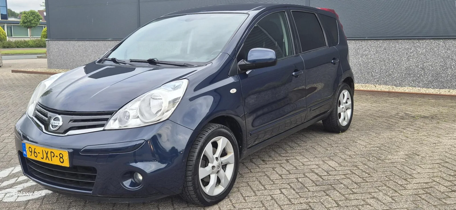 Nissan Note (2009) — foto 1