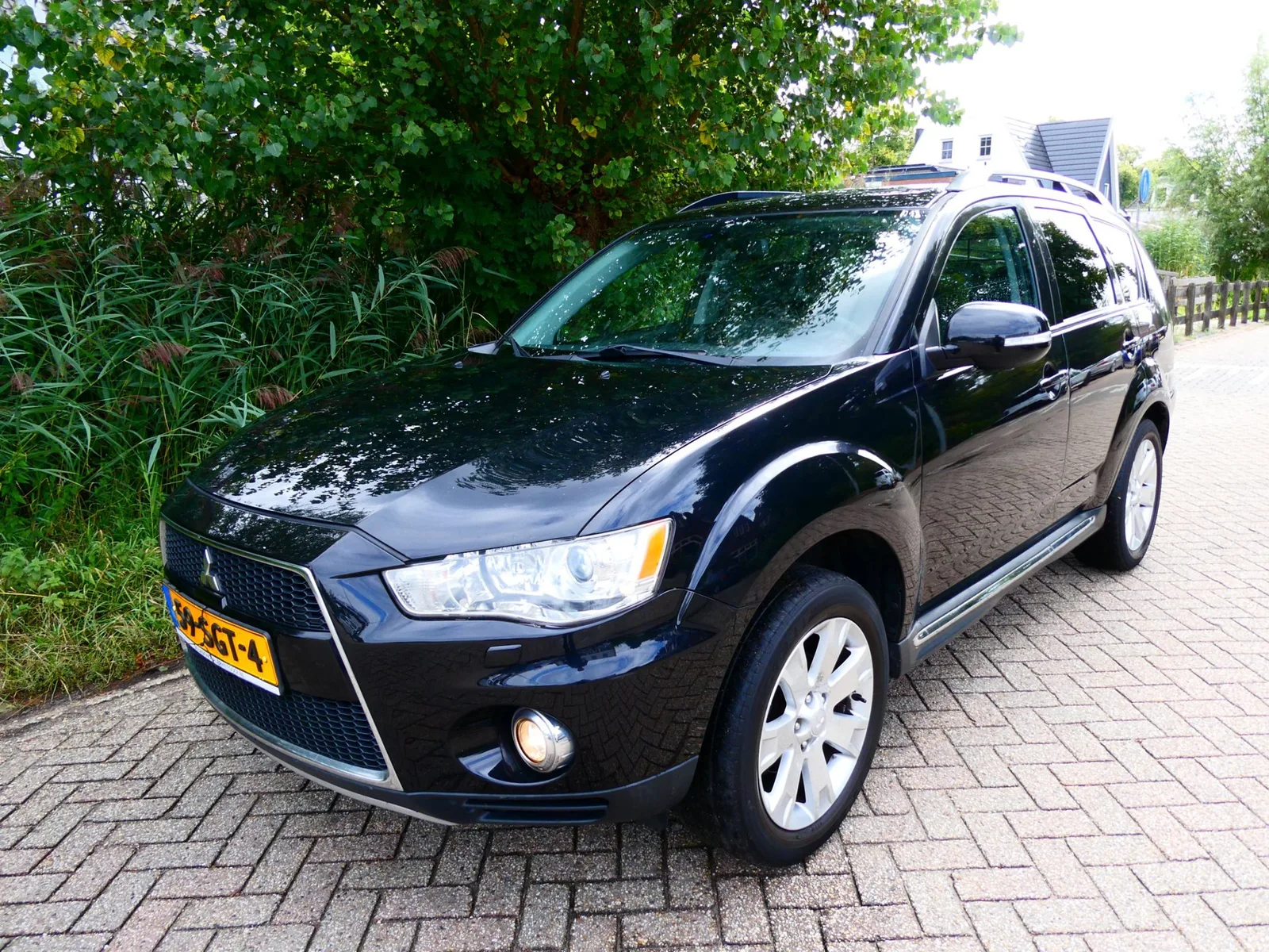 Mitsubishi Outlander (2011) — foto 1