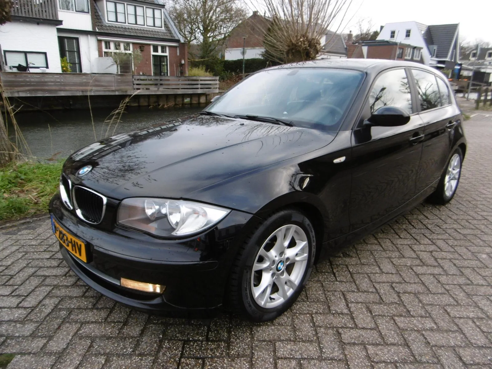 BMW 1-Serie (2009) — foto 1