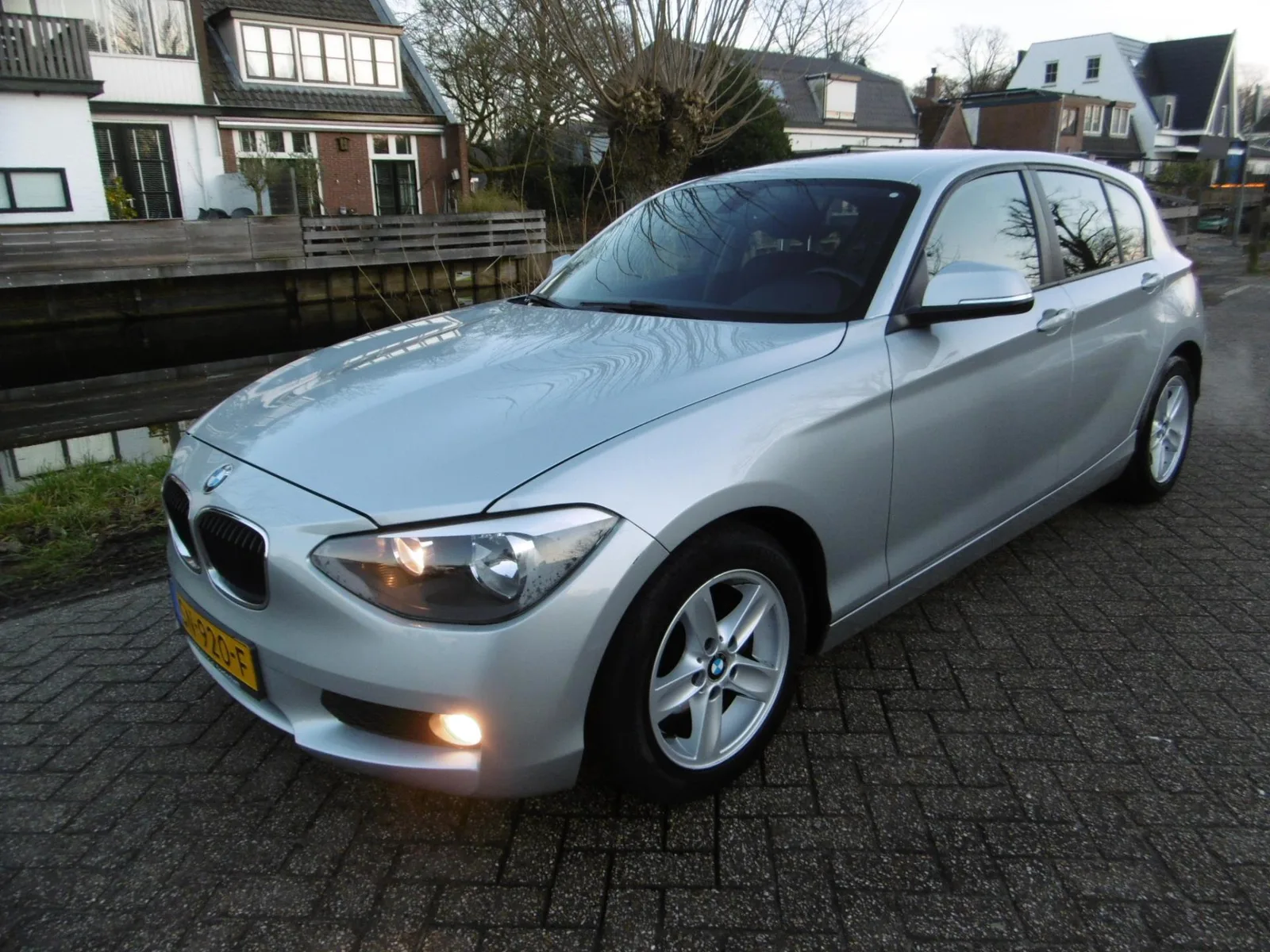 BMW 1-Serie (2011) — foto 1