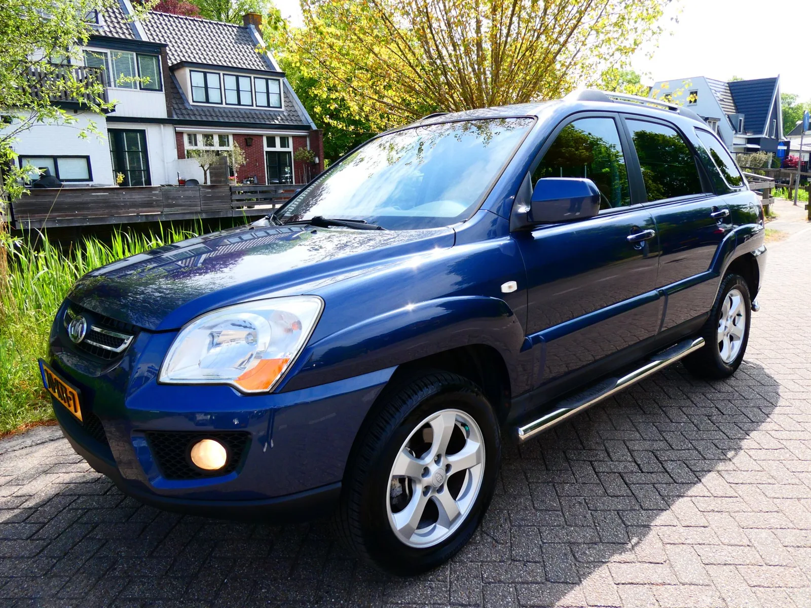 Kia Sportage (2010) — foto 1