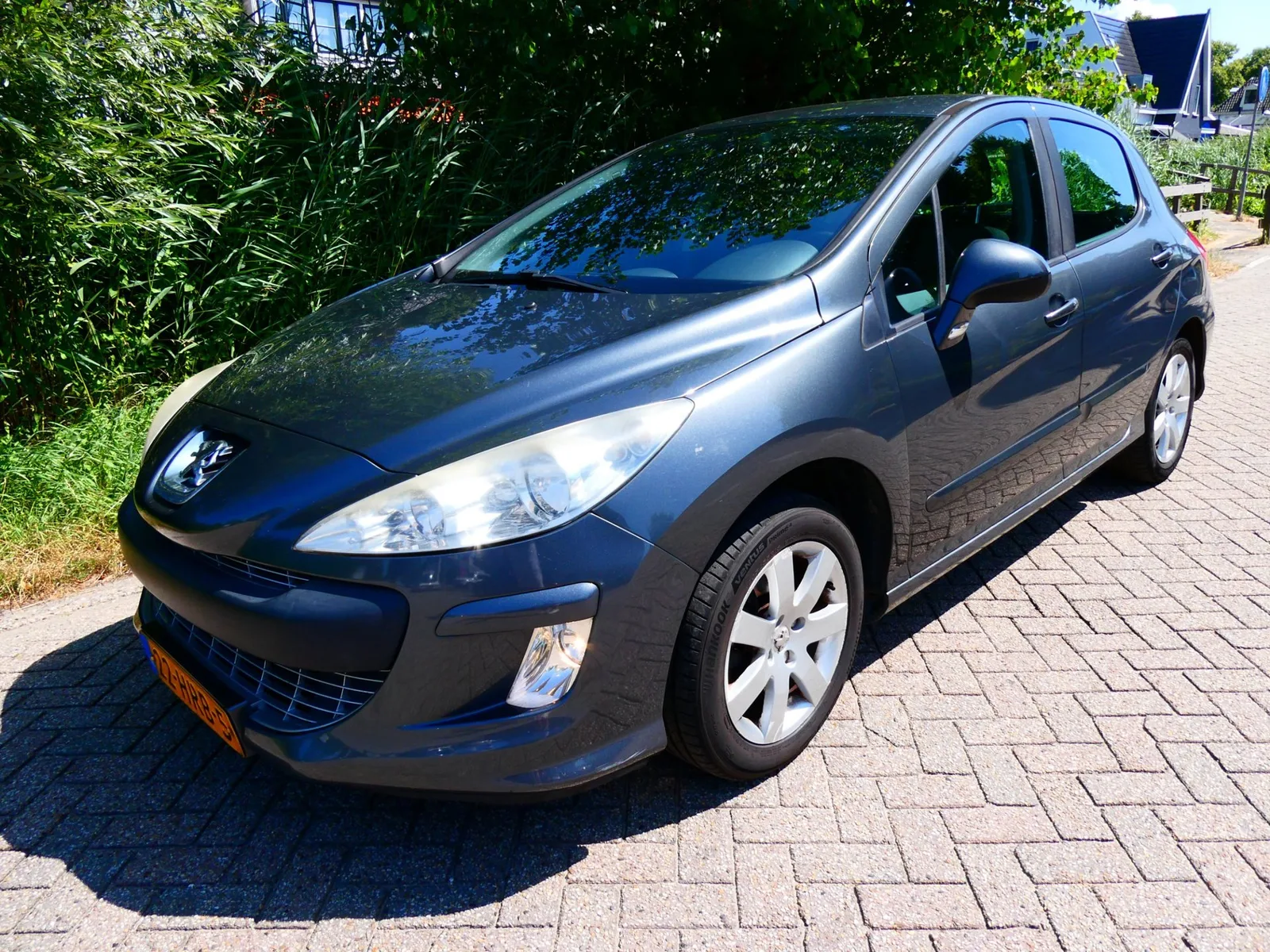 Peugeot 308 (2009) — foto 1