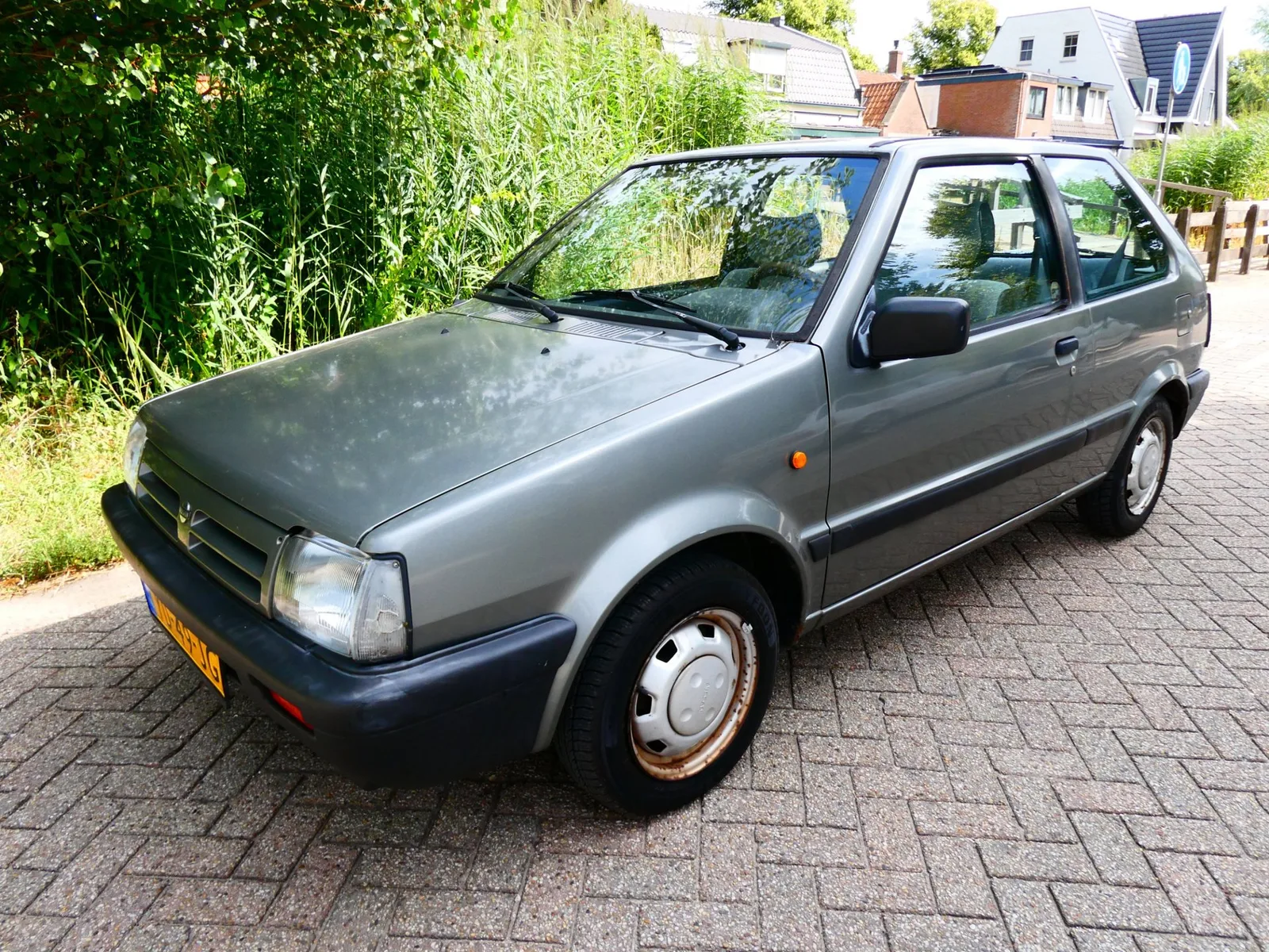 Nissan Micra (1990) — foto 1