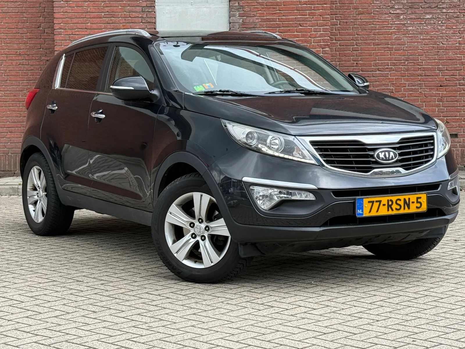 Kia Sportage (2011) — foto 1