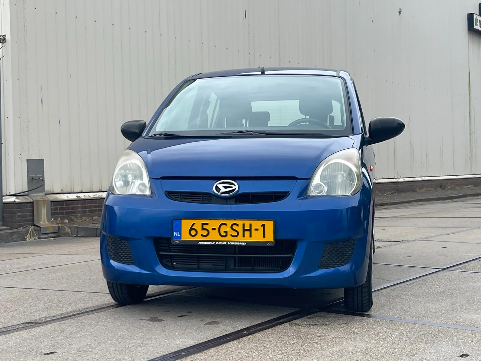 Daihatsu Cuore (2008) — foto 1