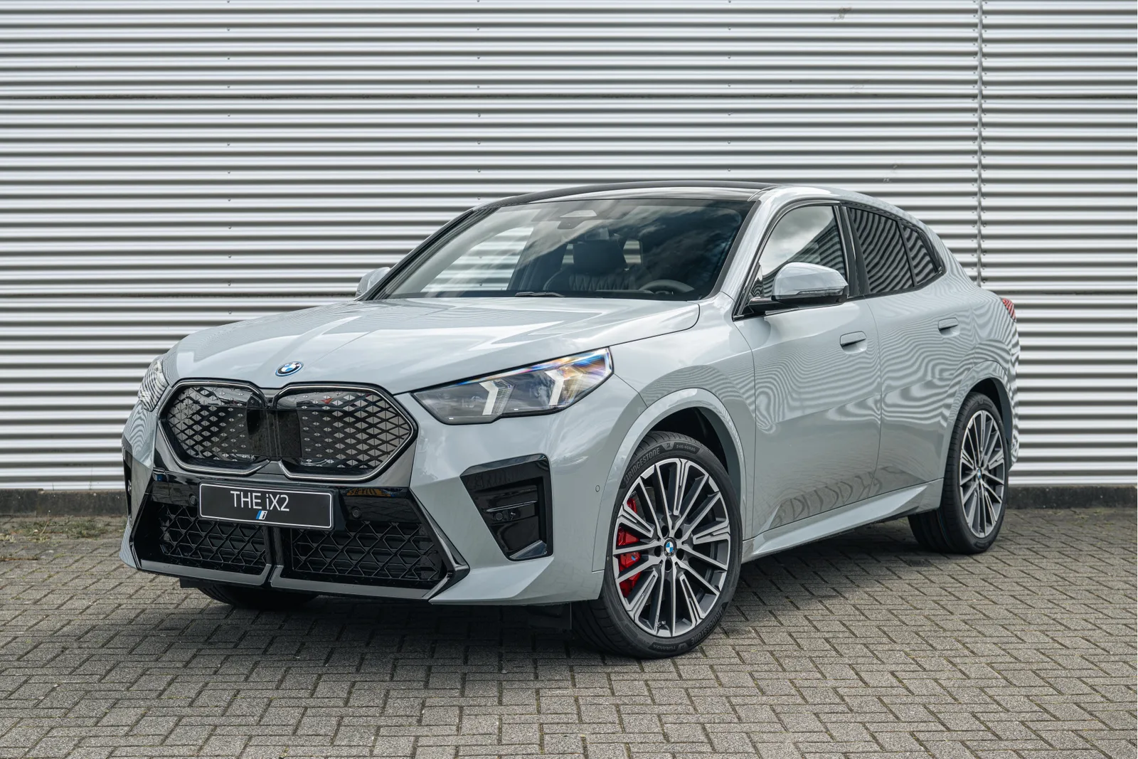 BMW iX2 (2026) — foto 1