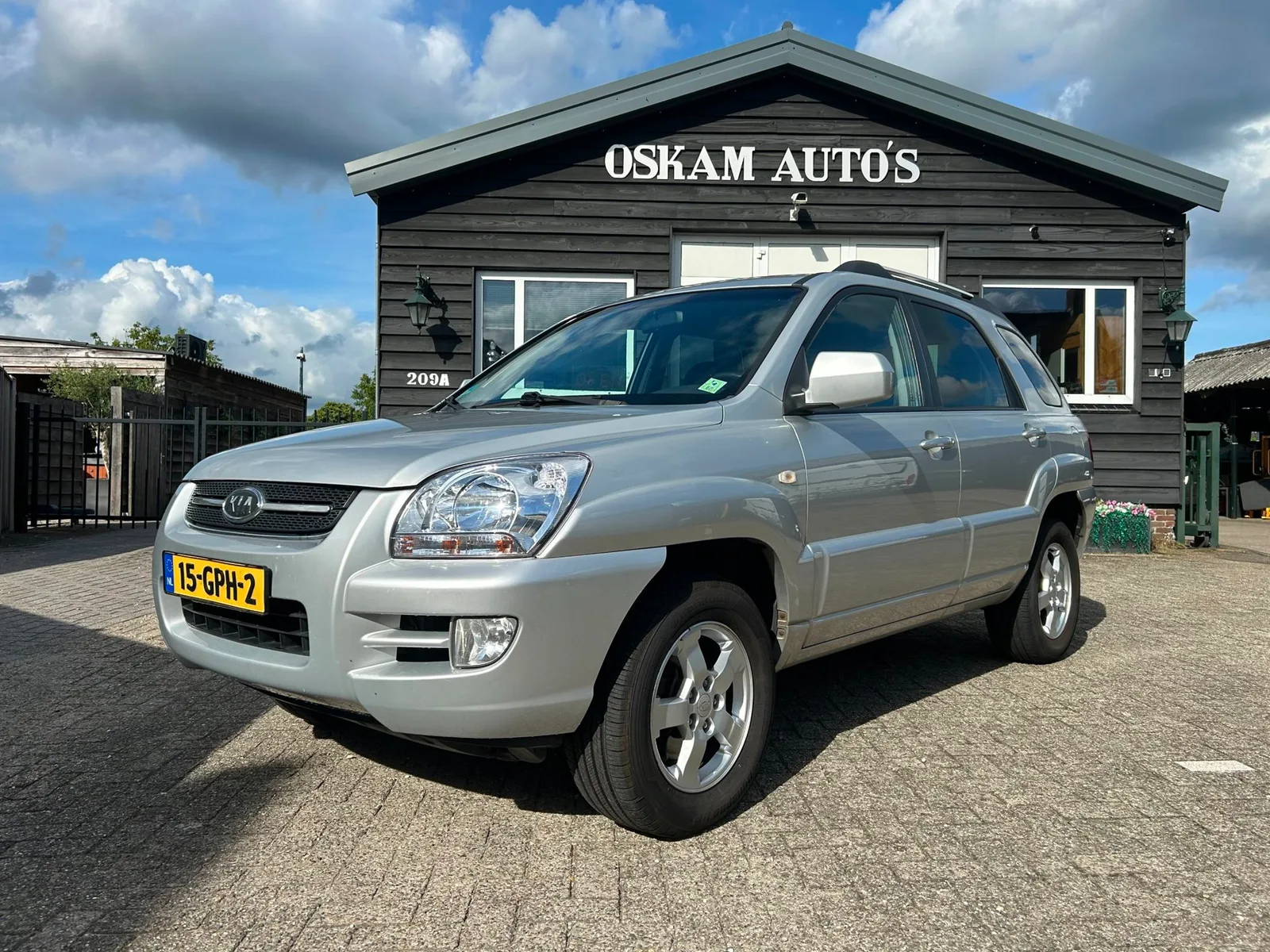 Kia Sportage (2009) — foto 1