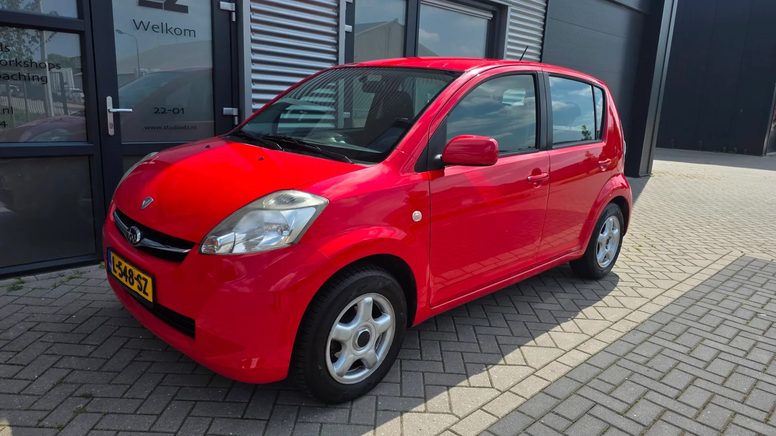 Subaru Justy (2009) — foto 1