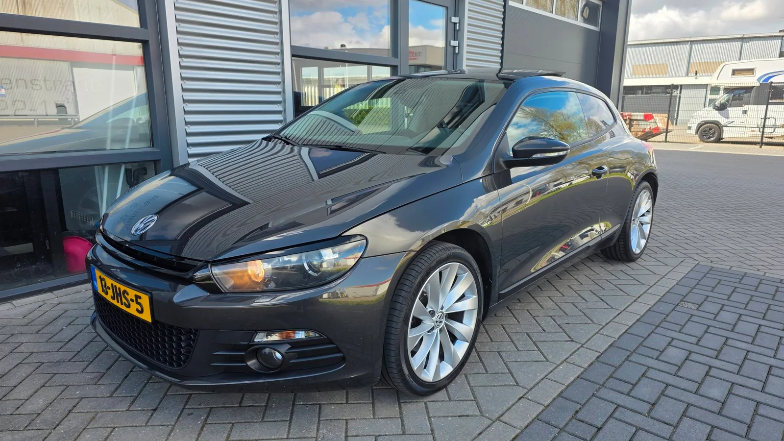 Volkswagen Scirocco (2009) — foto 1