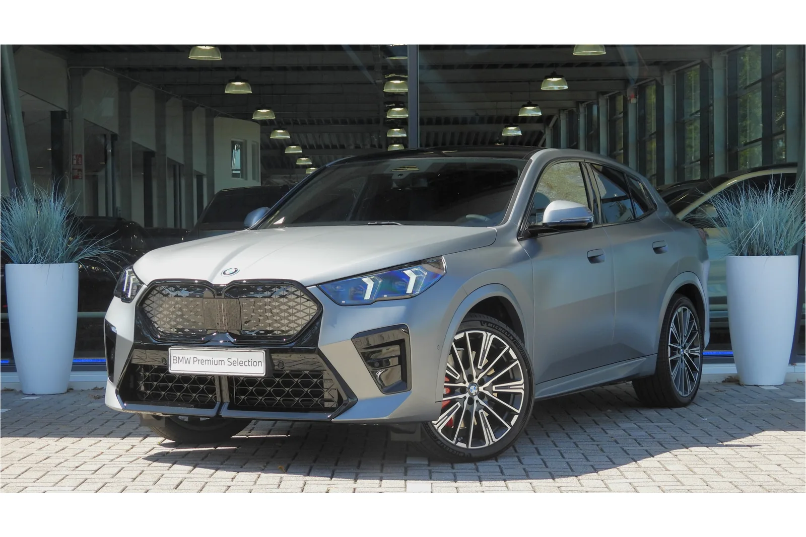 BMW iX2 (2026) — foto 1