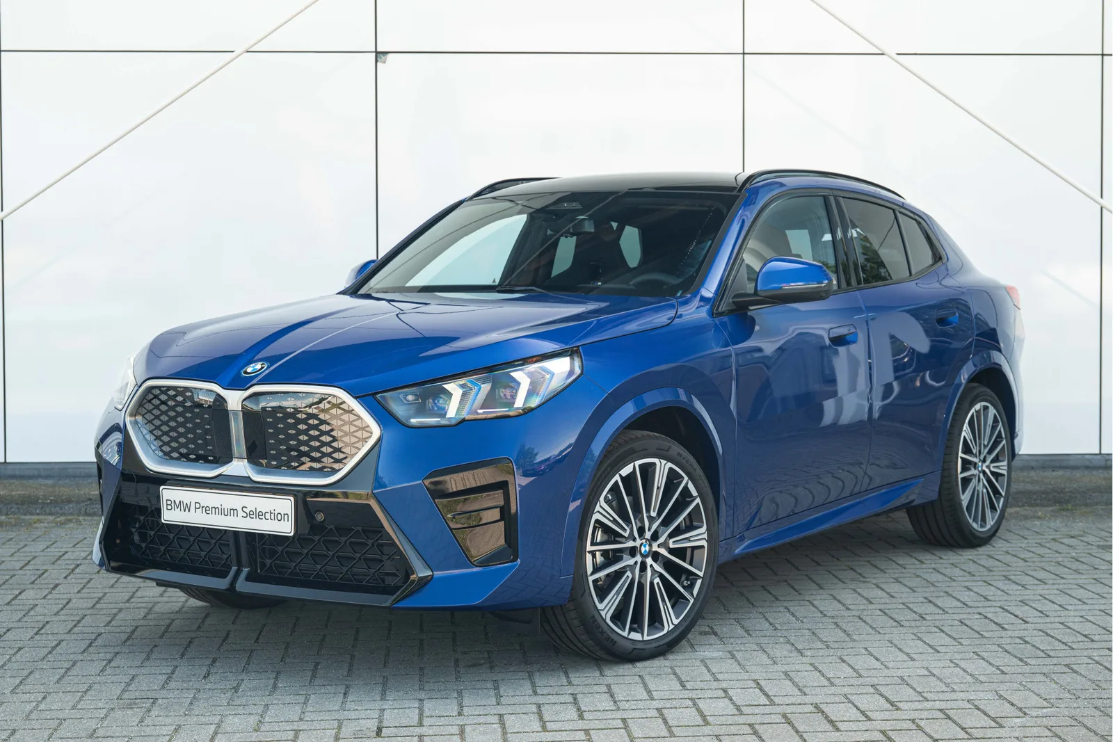 BMW iX2 (2026) — foto 1