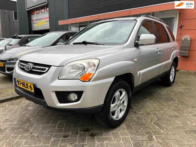 Kia Sportage (2009) — foto 1