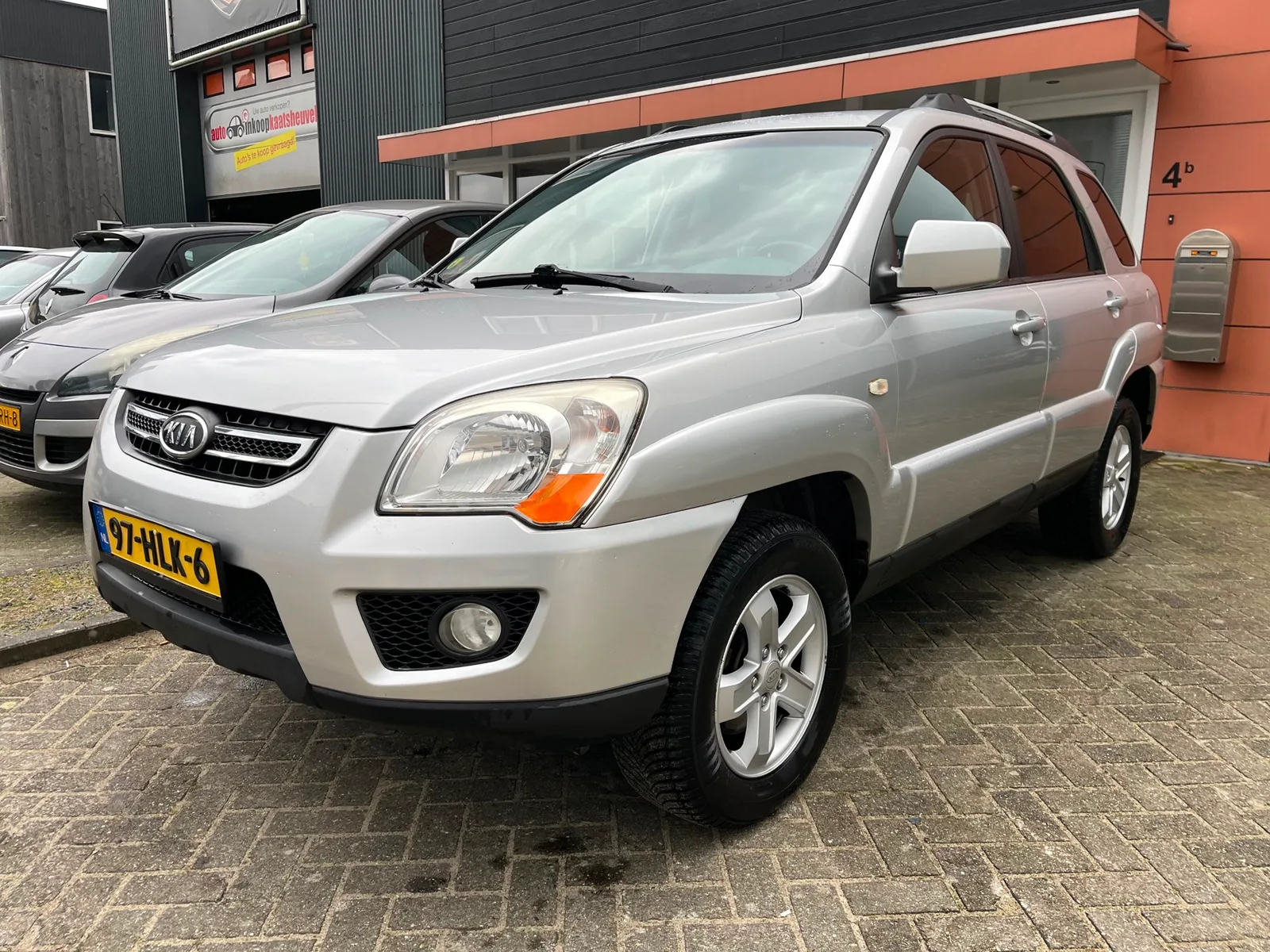 Kia Sportage (2009) — foto 1