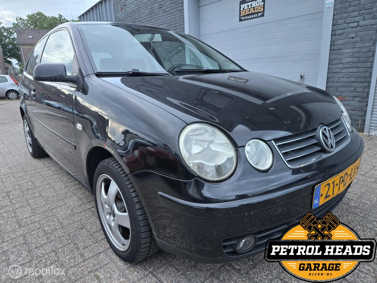 Volkswagen Polo (2004) — foto 1