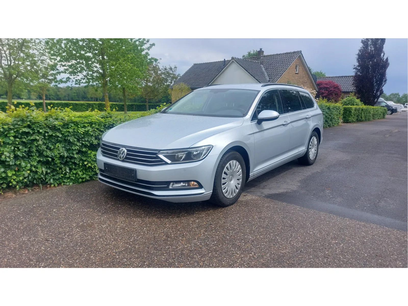 Volkswagen Passat (2014) — foto 1