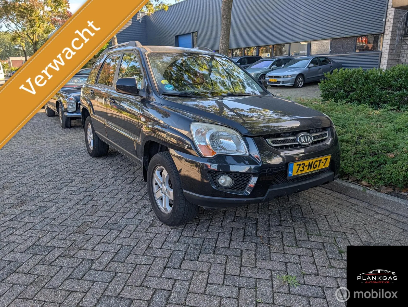Kia Sportage (2010) — foto 1