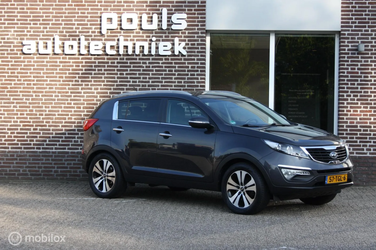 Kia Sportage (2012) — foto 1