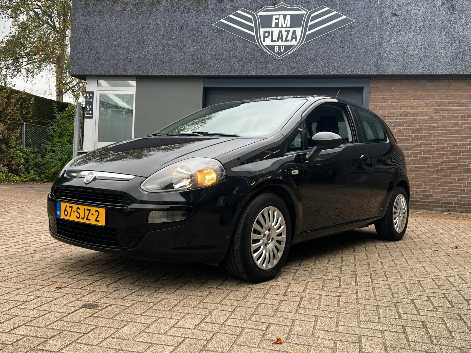 Fiat Punto (2011) — foto 1