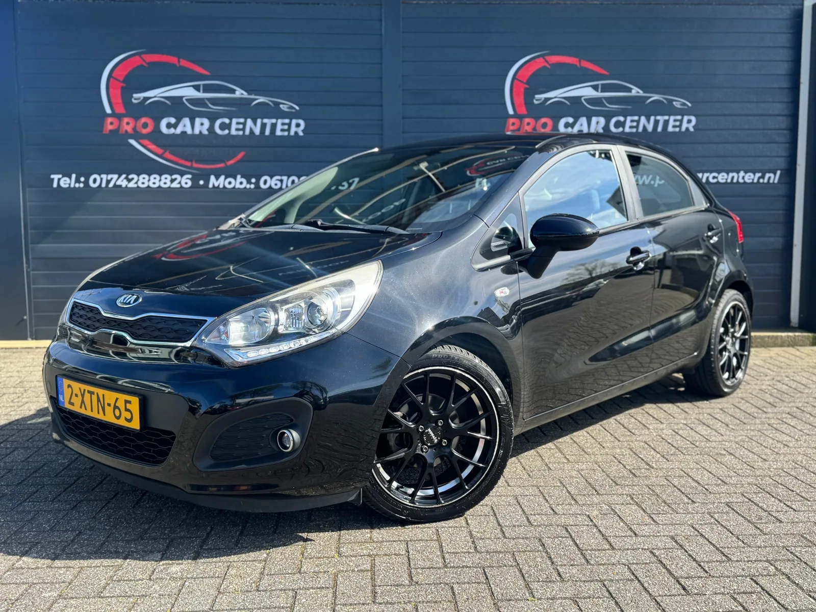 Kia Rio (2014) — foto 1