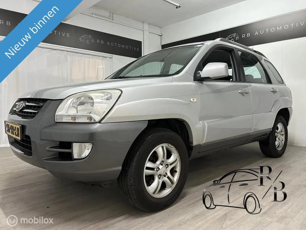 Kia Sportage (2006) — foto 1