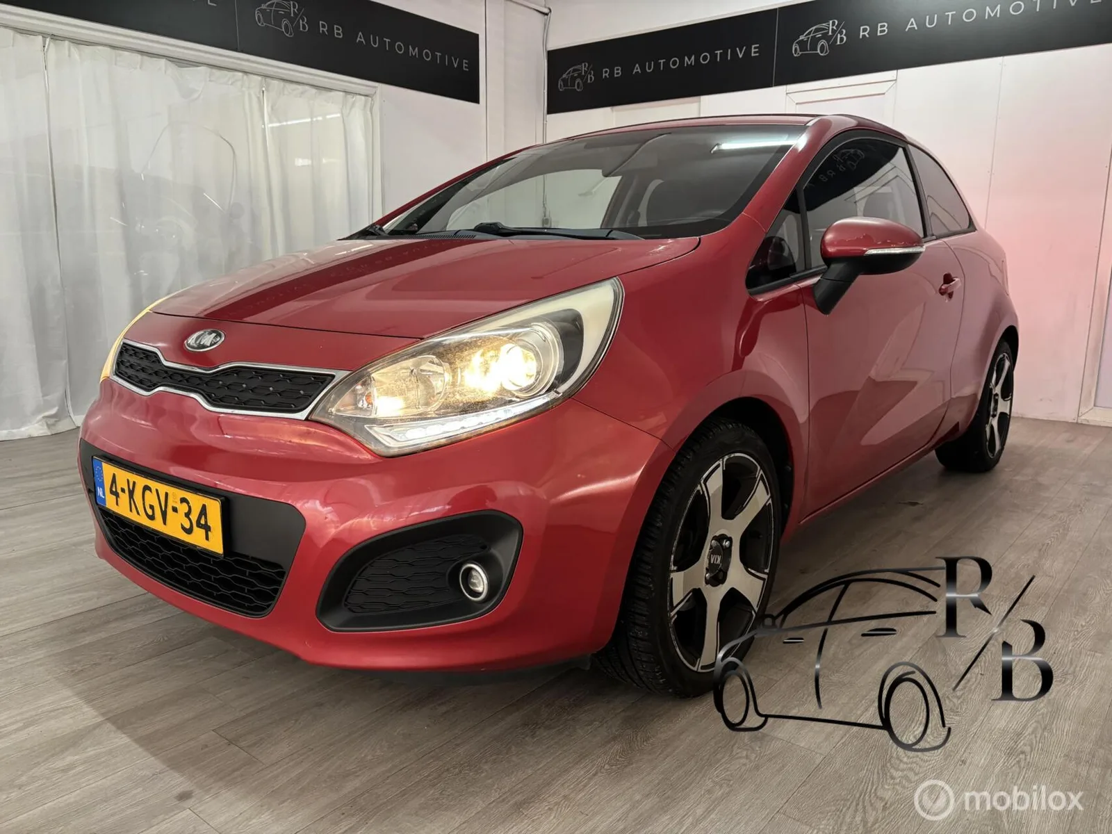 Kia Rio (2013) — foto 1