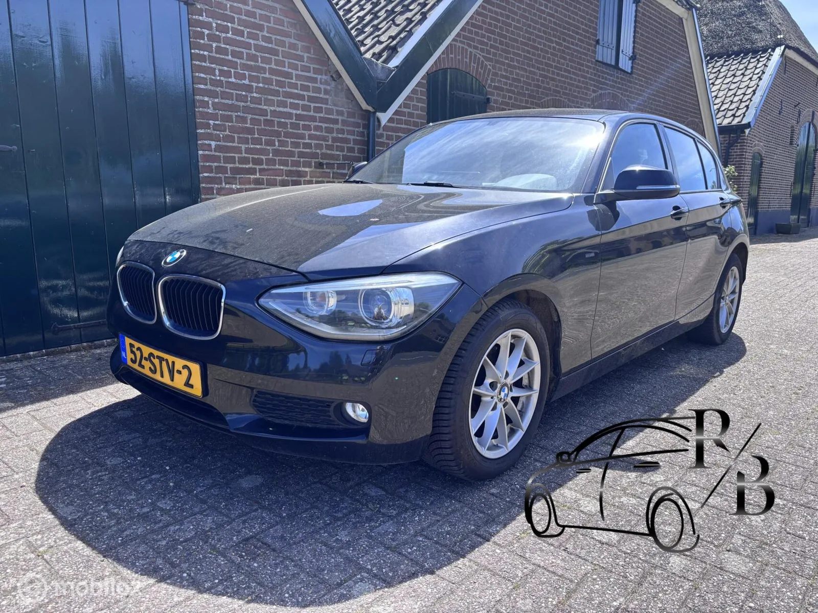 BMW 1-Serie (2011) — foto 1