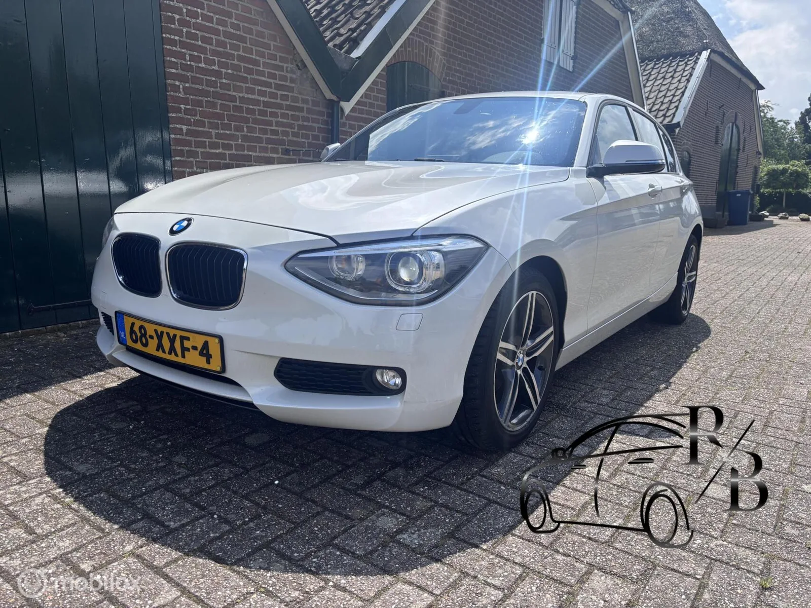 BMW 1-Serie (2012) — foto 1