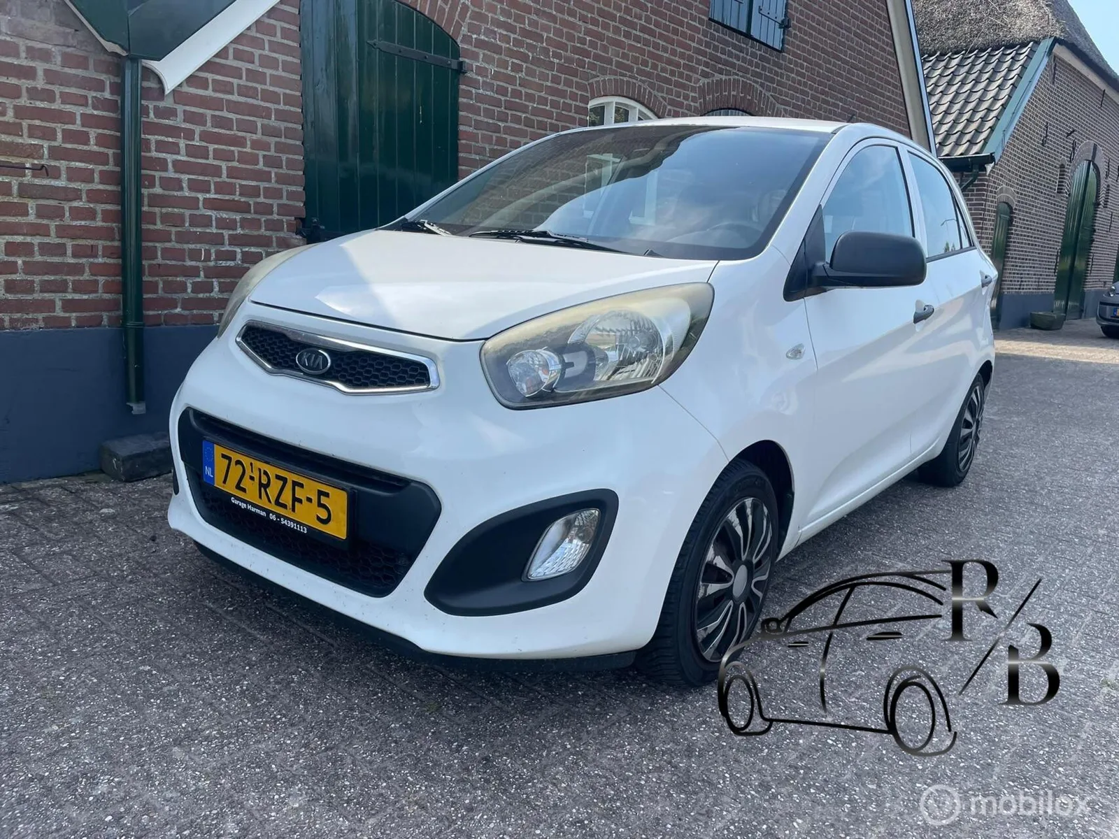 Kia Picanto (2011) — foto 1
