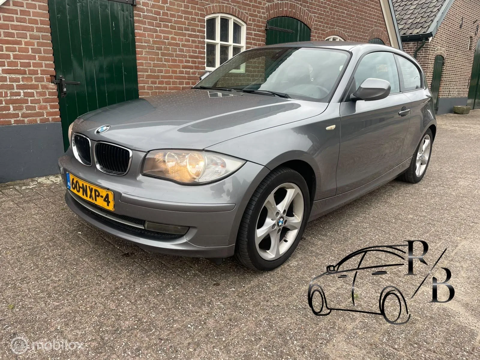 BMW 1-Serie (2010) — foto 1