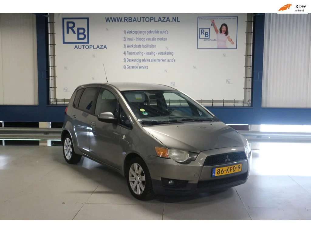 Mitsubishi Colt (2009) — foto 1