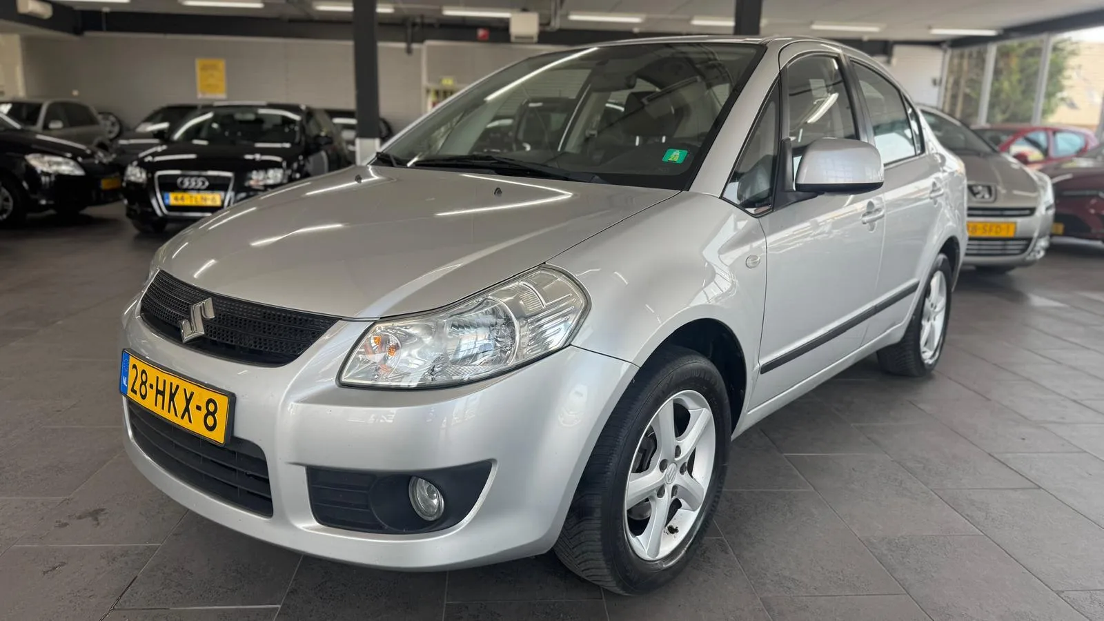 Suzuki SX4 (2009) — foto 1