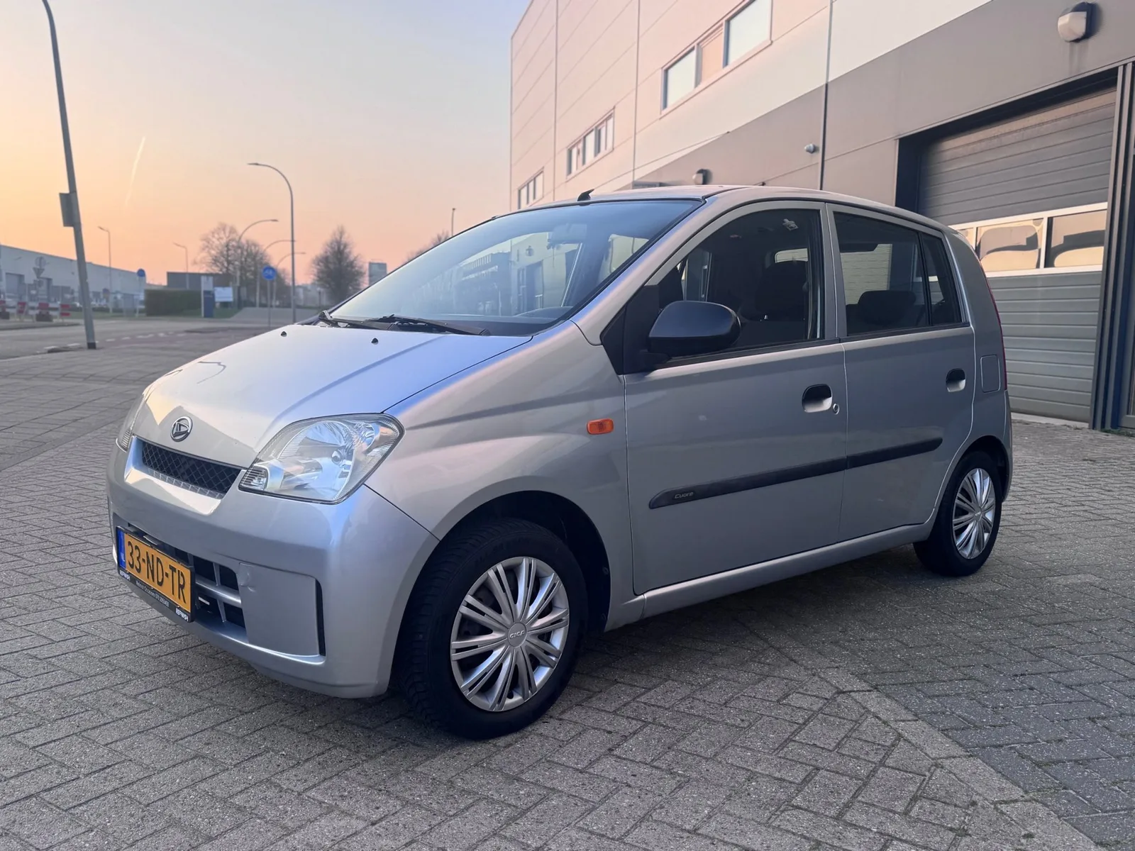 Daihatsu Cuore (2003) — foto 1