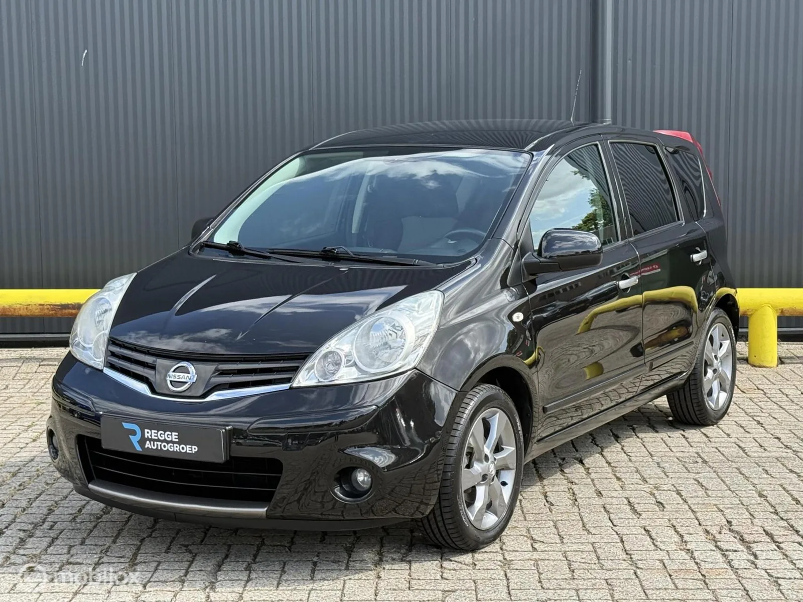 Nissan Note (2011) — foto 1