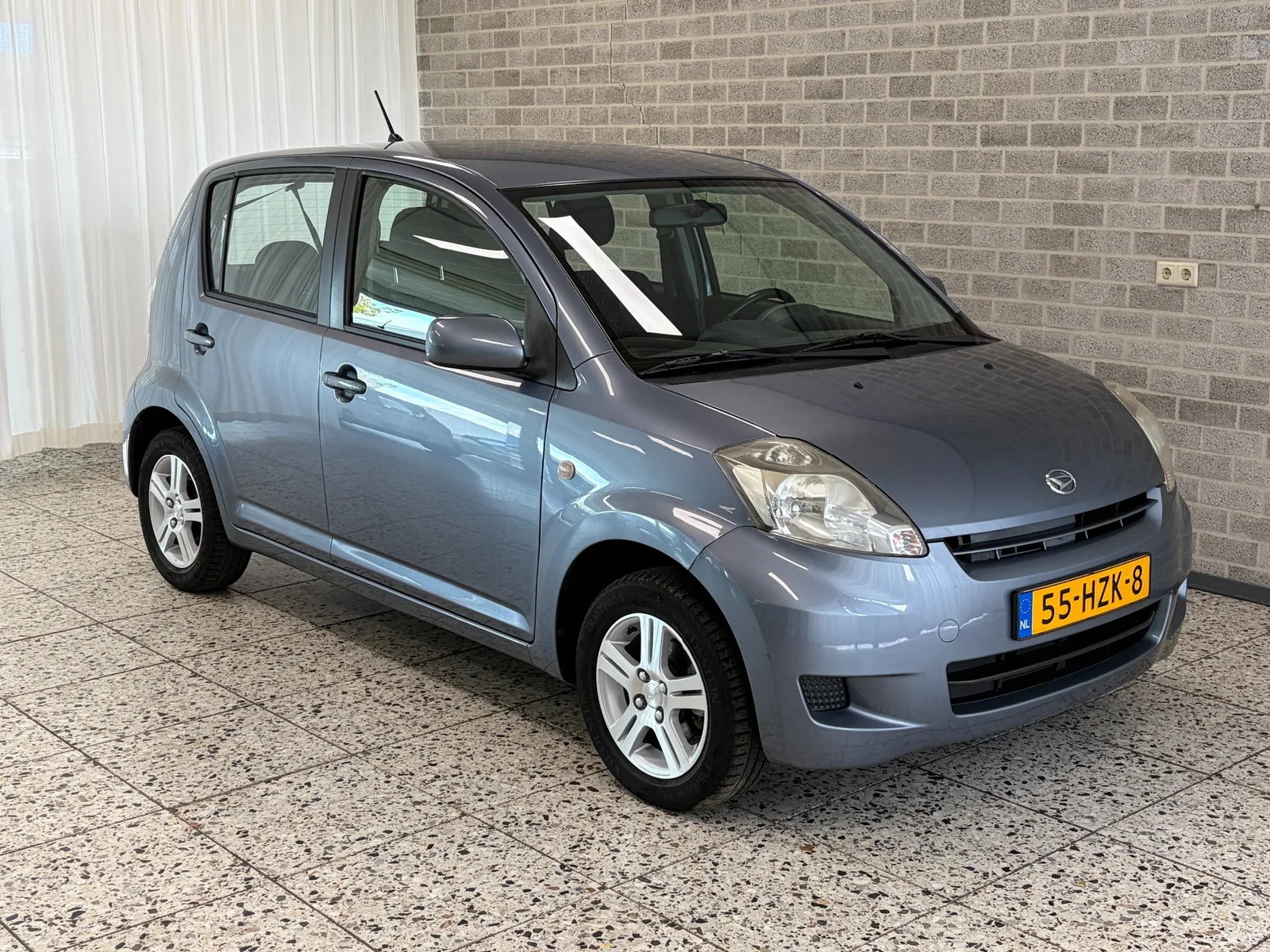 Daihatsu Sirion (2009) — foto 1