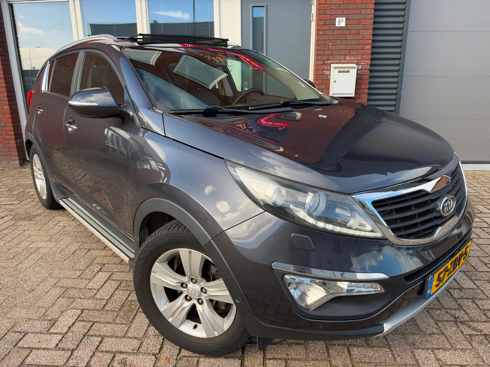 Kia Sportage (2012) — foto 1