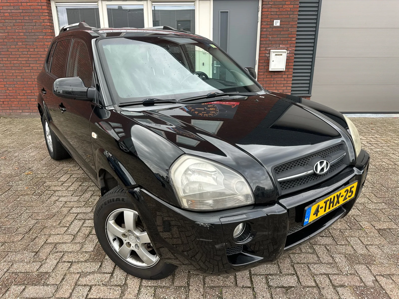 Hyundai Tucson (2006) — foto 1