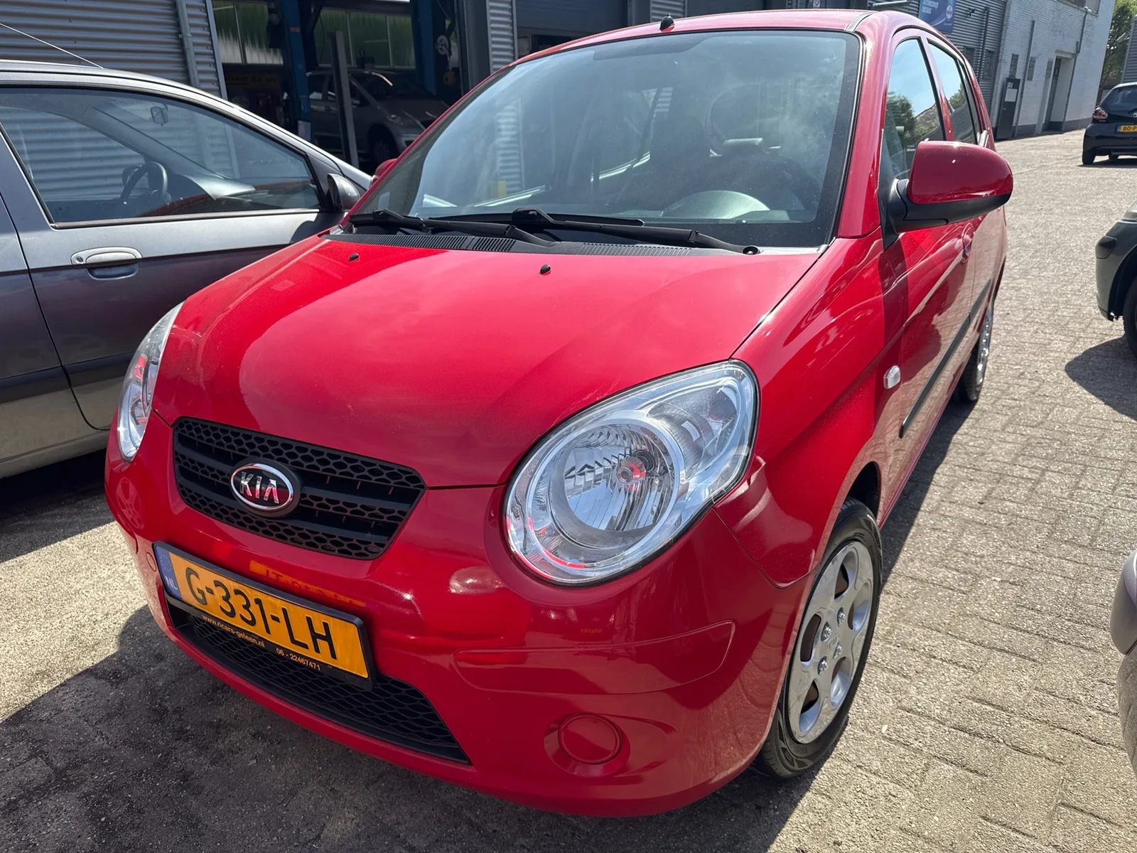 Kia Picanto (2009) — foto 1