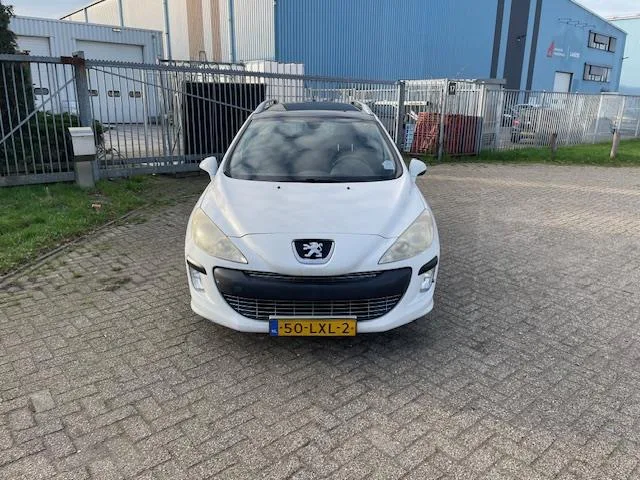 Peugeot 308 (2010) — foto 1