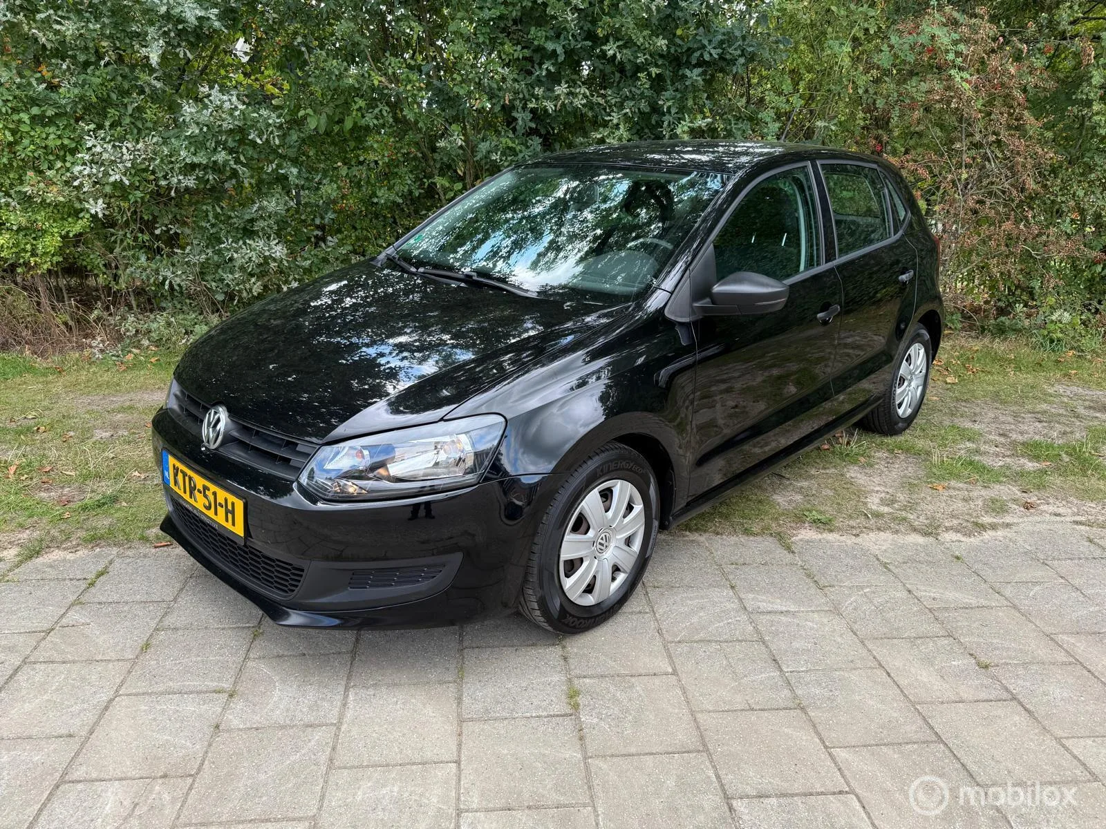 Volkswagen Polo (2009) — foto 1