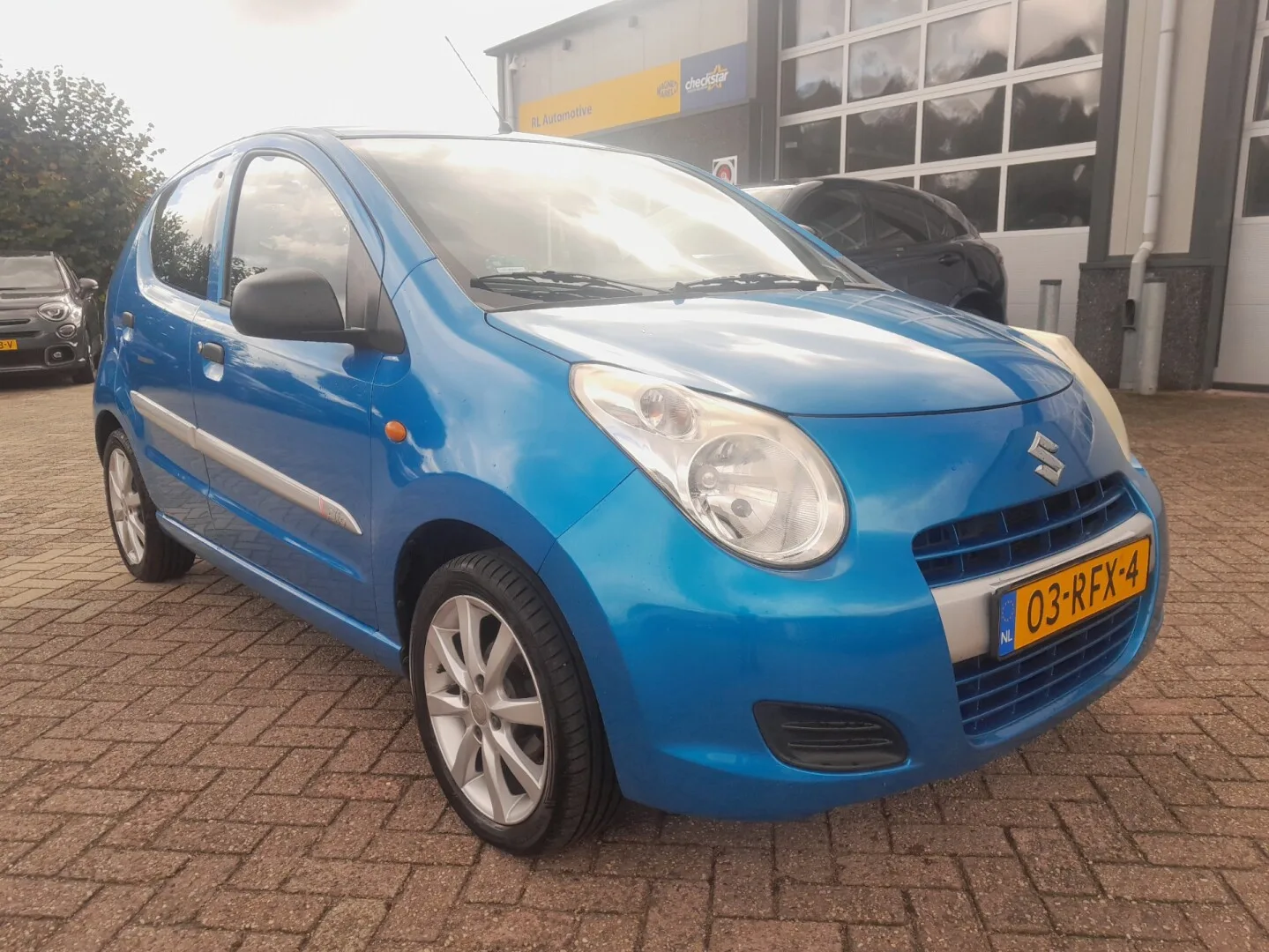 Suzuki Alto (2011) — foto 1