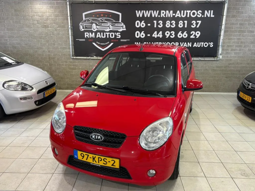 Kia Picanto (2010) — foto 1