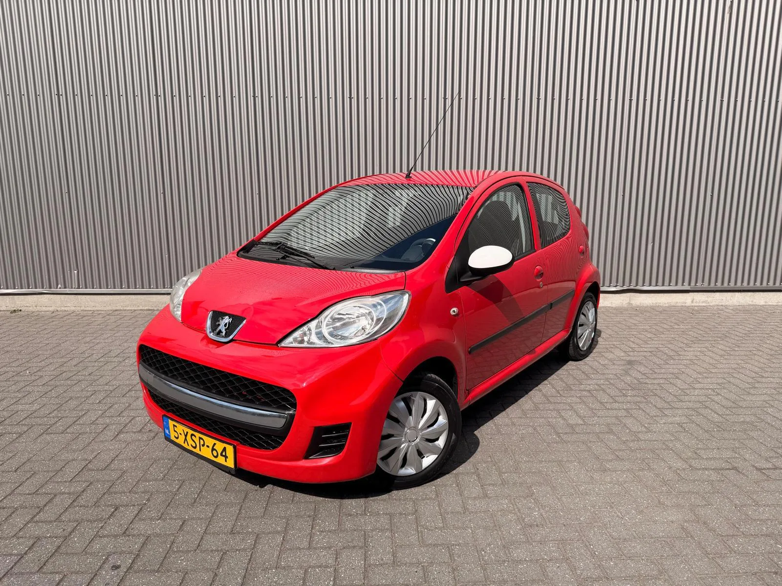 Peugeot 107 (2011) — foto 1