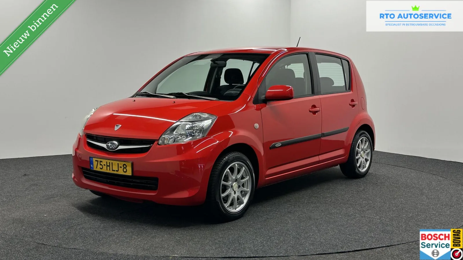 Subaru Justy (2009) — foto 1