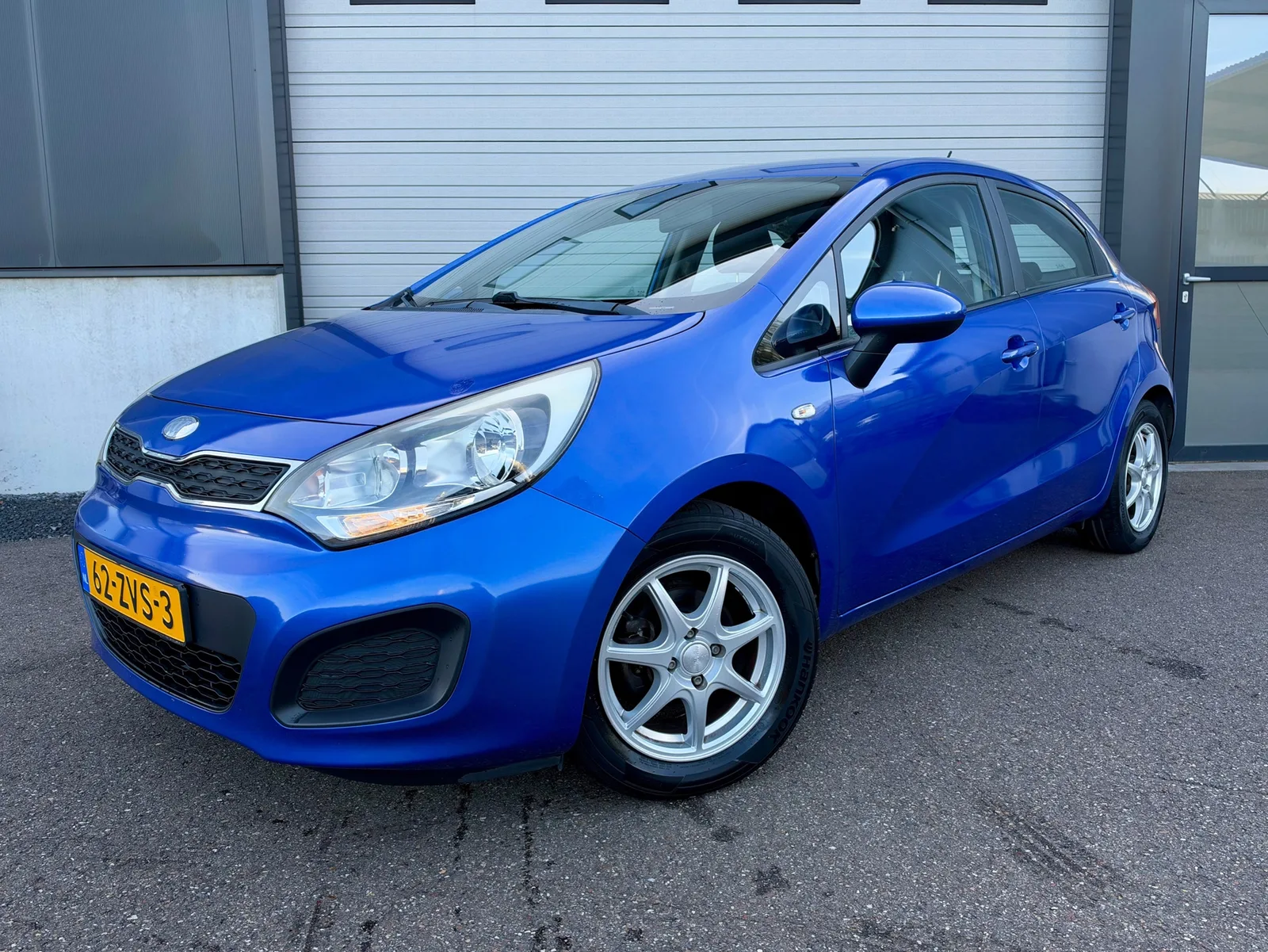 Kia Rio (2013) — foto 1