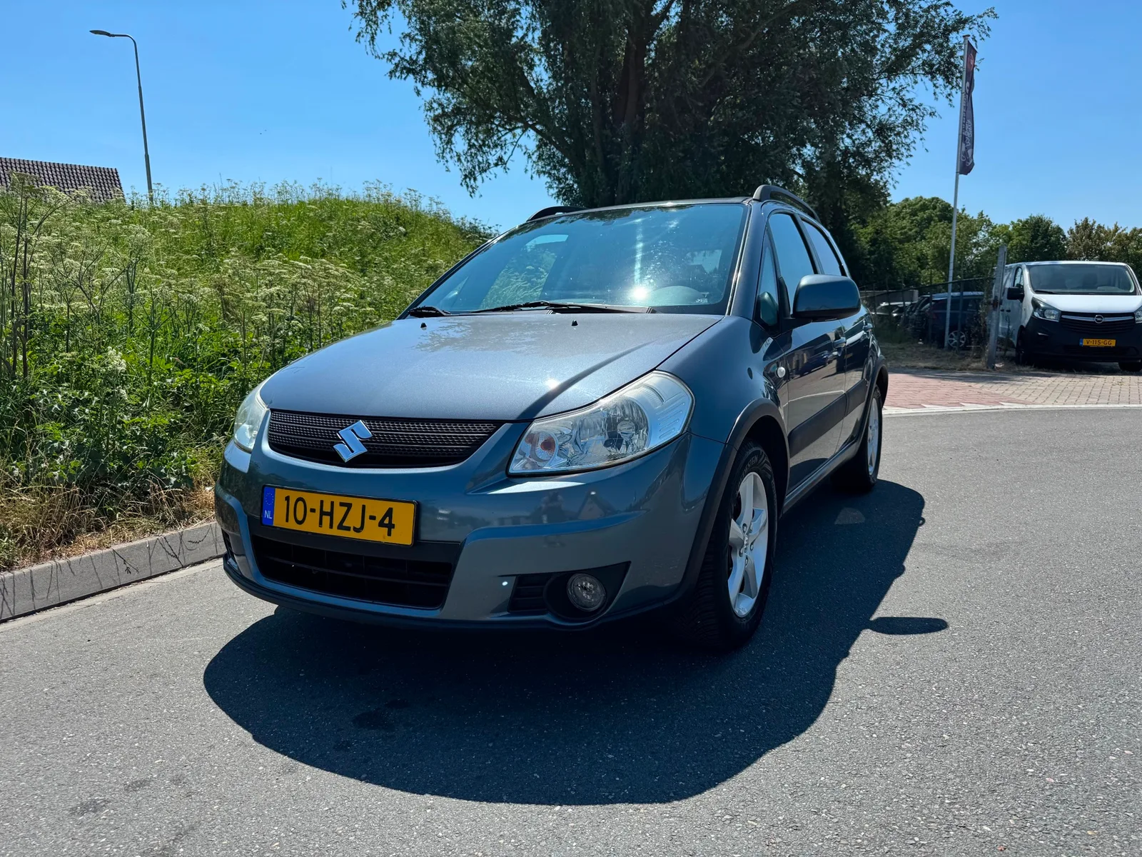 Suzuki SX4 (2009) — foto 1