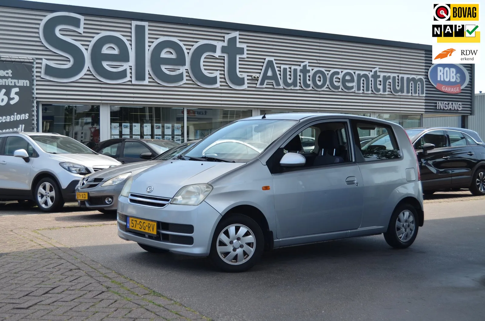 Daihatsu Cuore (2006) — foto 1